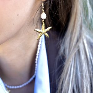 ISÉA boucles en perle d'eau douce, surmontée d'une grande étoile de mer en acier inoxydable doré